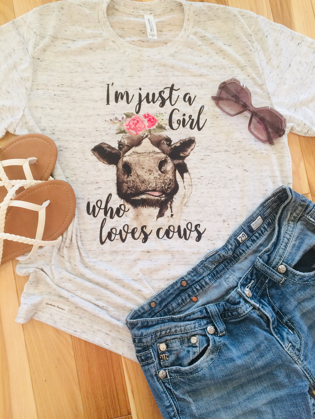 Just a girl who loves cows on a Bella Canvas white marble T-shirt